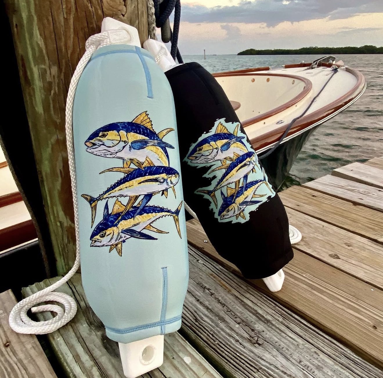 Custom tuna art FenderSox on classic wooden boat dock